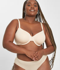 Smiling woman wearing Toasted Almond All-Day T-Shirt Bra in 36DDD by LIVELY