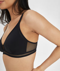 Nylon cups and mesh fabric on 34B woman wearing Jet Black Mesh Trim Bralette by LIVELY