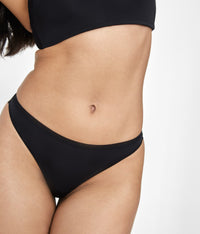 Woman wearing small, Jet Black No Show Thong by LIVELY